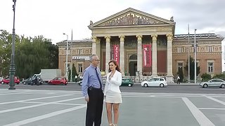 Adorable redhead with fake tits enjoys a hardcore doggy style pounding