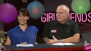 Handsome male porn star laughing and chatting backstage