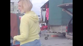 Blonde smiles into cam flashing the hot downblouse