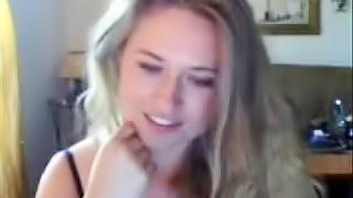 Busty blonde sucking dildo