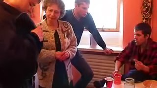 Horny granny gets fucked by multiple guys at the same time