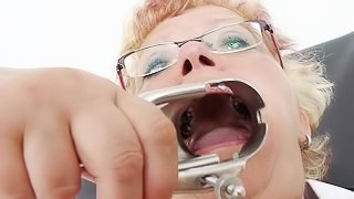 Deep masturbation by hairy mature