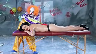 A creepy clown gives this girl a massage then fucks her