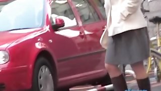 Mature Asian has a public skirt sharking experience.