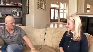 Mini-skirt clad blonde with a shaved pussy enjoying a hardcore fuck on her couch