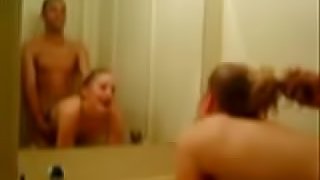 Teen couple fucking in front of the mirror