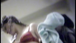 Spy cam beauty in changing room changes her bikini