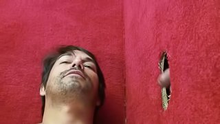 Tattooed gay Brad giving dick blowjob while wanking