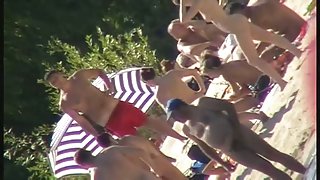 Nude beach voyeur shoots a hot babe with a hidden cam