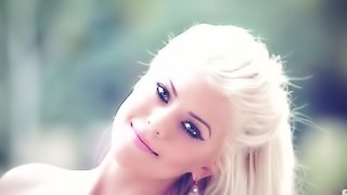 Beautiful blonde Annette White shows off her hot body