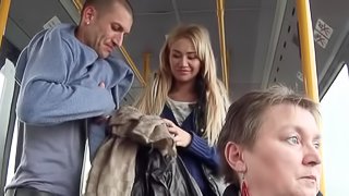 A blonde is getting fucked hard in the bus while people are looking
