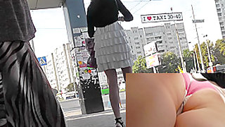 Pretty upskirt panties covering her hot buttocks