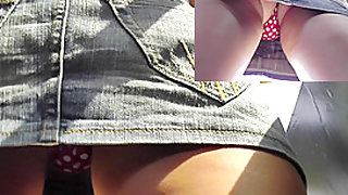 Upskirt in bus with young girl in short jean skirt