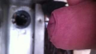 chav pissing and wanking at urinal