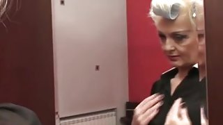 Perverted granny masturbates on the bed