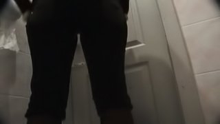 Hot busty babe is peeing with pleasure