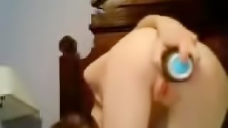 Tight chick with green dildo getting off alone