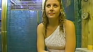 Hot  blonde jerks her boyfriends big cock in the bathroom
