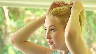 A bimbo with small tits and a sexy little ass is penetrated on bed