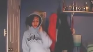 Curly brunette in school sweatshirt shows off her sexy body