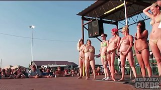 Girls dance and strip at biker rally