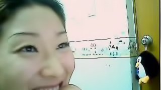 Homemade video of an asian slut playing with her hairy pussy