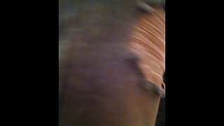 Amateur girl is playing with phone pissing on toilet