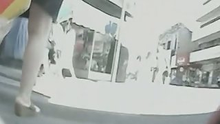 Curvy  MILF lets a voyeur put a cam up her skirt