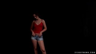 Cute brunette in a solo striptease porn video