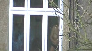 neighbour opening curtains