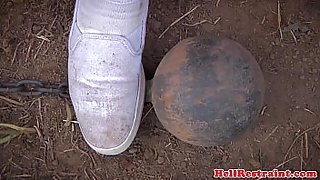 Submissive prisoner strips for maledom