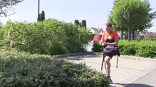 Blonde cutie in shorts enjoys an outdoors pussy drilling session