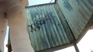 Sweetie in beach change cabin changes cloths and shows body