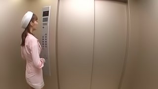 Pretty pink skirt suit on the Asian blowing you in an elevator