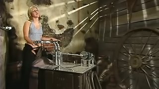 Jolene gets her ass and vag drilled by a fucking machine in a cellar