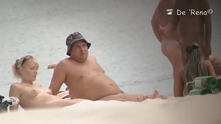 Blonde mature chick is naked at the beach