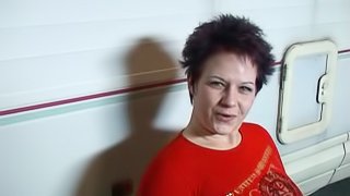 A chick with spiked hair sucks this guy's cock and makes him jizz