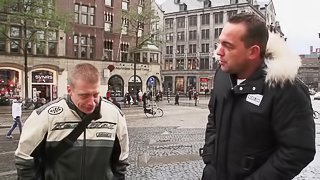 In the red light district a guy gives him a free romp with a whore